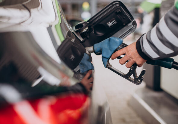 Car refueling at fuel station